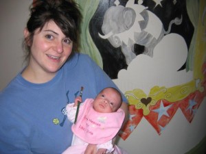 Danni preemie holding a Paint brush with me