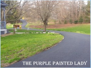 The Purple painted Lady paved driveway home