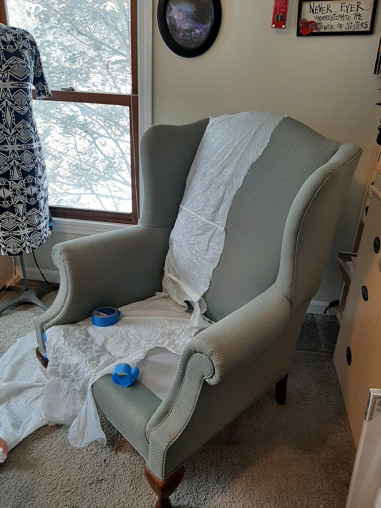 Woman Paints Leather Chair as a Test Before Painting a Couch